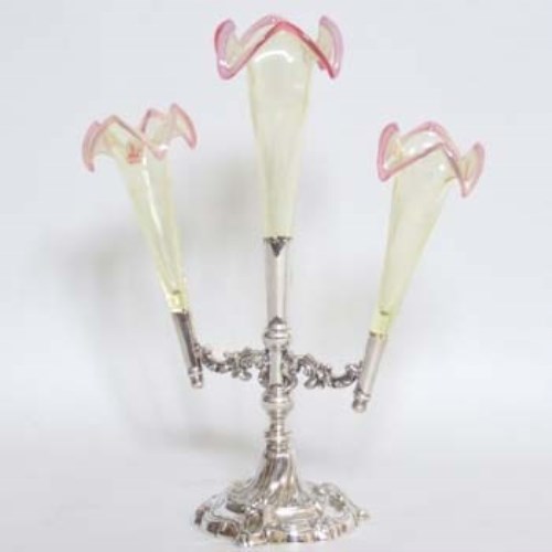 Lot 211 - Vaseline glass and silver plate epergne.
