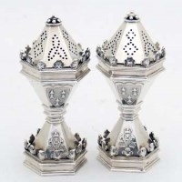 Lot 238 - Pair Jubilee silver neo gothic pounce pots.