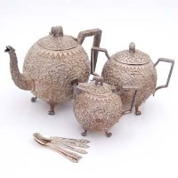 Lot 256 - Indian silver 3 piece tea set and 6 siam silver