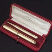 Lot 275 - Mabie, Todd & Co.  Gold Plated Pen and Pencil in