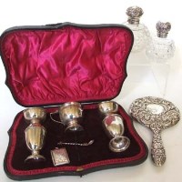 Lot 238 - Two silver topped glass scent bottles, silver