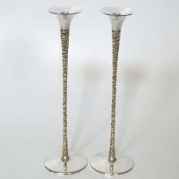 Lot 239 - A pair of silver candlesticks by Stuart Devlin