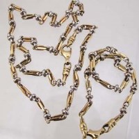 Lot 265 - Two 18ct gold bi-coloured chains
