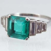 Lot 286 - Emerald and diamond ring, in Cartier box