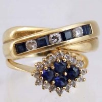 Lot 305 - Two 18ct gold sapphire and diamond rings