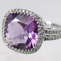 Lot 316 - 18ct White gold amethyst and diamond cushion