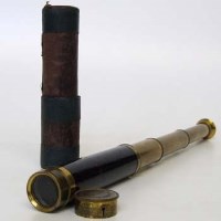 Lot 394 - Victorian brass three draw pocket telescope by