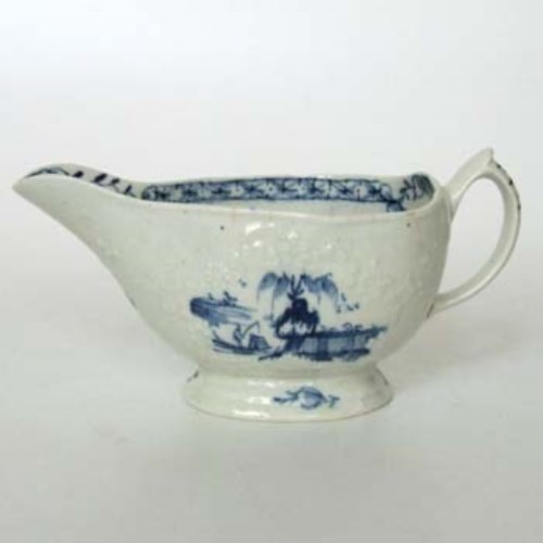 Lot 492 - Lowestoft sauceboat circa 1770   with floral