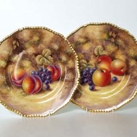 Lot 555 - Pair of Royal Worcester plates signed Smith