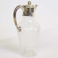 Lot 183 - Silver mounted claret jug