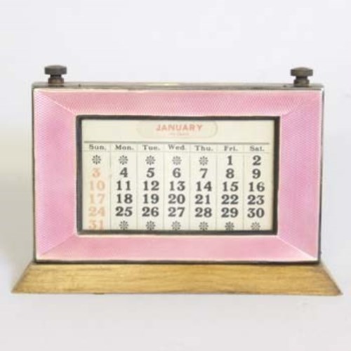 Lot 191 - Silver pink enamel perpetual calendar