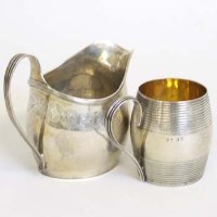 Lot 202 - Silver Georgian helmet and a silver mug