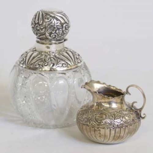 Lot 204 - Silver mounted cut glass scent bottle; small