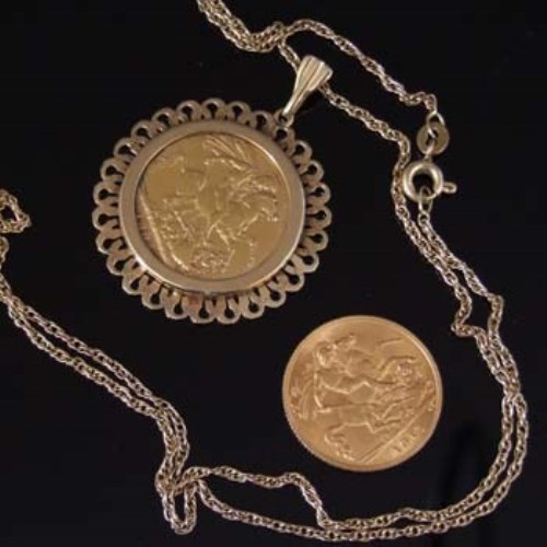 Lot 211 - Mounted gold sovereign and a half sovereign.
