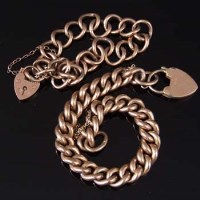 Lot 237 - Nine carat gold flat curb bracelet chain and