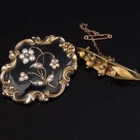 Lot 310 - 19th century gold mourning brooch, and another brooch.