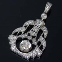 Lot 322 - Art deco white gold and pave diamond plaque