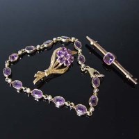 Lot 326 - Amethyst bracelet and two brooches