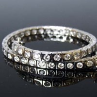 Lot 328 - 18ct white gold and diamond line bracelet compsed