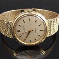 Lot 354 - Eighteen carat gold IWC man's automatic wristwatch.