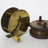 Lot 404 - Farlows brass reel and one other wooden reel.