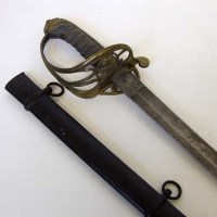 Lot 414 - Sword in scabbard.