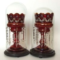 Lot 497 - Pair of cranberry glass lustre