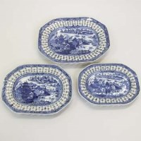 Lot 507 - Three graduated Chinese pierced meat plates.