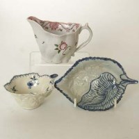 Lot 528 - Worcester butter boat, Liverpool leaf dish, Coalport low chelsea ewer