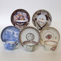 Lot 541 - Three Herculaneum cups and saucers circa 1810