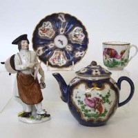 Lot 560 - Samson teapot saucer, cup and figure of a Street Vendor