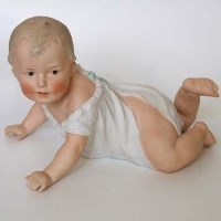 Lot 577 - Gebruder Heubach bisque piano baby
