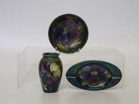 Lot 608 - Three pieces of Moorcroft clematis pattern.