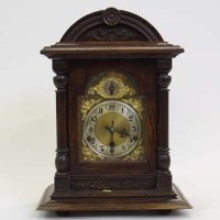 Lot 626 - German oak bracket clock