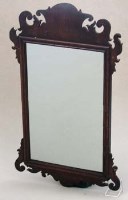 Lot 641 - Chippendale period mahogany wall mirror.