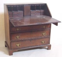 Lot 659 - George III oak bureau.