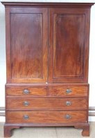 Lot 662 - George III press of two doors over drawers.