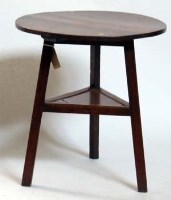 Lot 670 - George III oak cricket table.