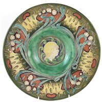 Lot 181 - Della Robbia charger, incised by Cassandra Annie Walker with a portrait of a lady within floral border with art nouveau curves, base dated 1900, 35cm diameter Condition report: No restoration. Mino...