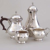 Lot 229 - Four piece silver tea set.