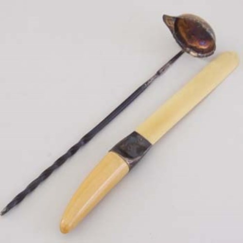 Lot 237 - Whale bone handled punch ladle and an ivoride paper knife.