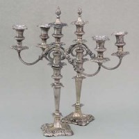 Lot 239 - Pair of silver candelabras.