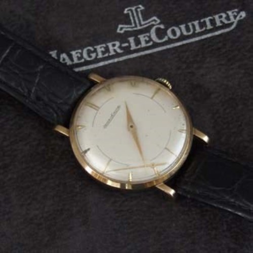 Lot 408 - Jaeger-Le Coutre mans nine carat gold wristwatch on leather strap (seconds hand detached), dated 1960