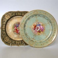 Lot 587 - Two Royal Worcester floral jewelled plates.