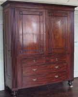 Lot 723 - Gentleman’s mahogany wardrobe on drawer base.