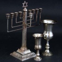 Lot 182 - Silver Jewish candelabrum and two kiddish cups