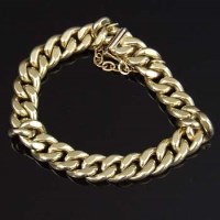 Lot 210 - 585 gold flat curb bracelet, approximately 27.9g