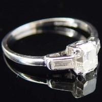 Lot 219 - Platinum and diamond ring, emerald cut