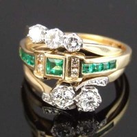 Lot 267 - 18ct gold emerald and diamond ring; three-stone