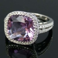 Lot 273 - Amethyst and diamond cushion cluster ring.